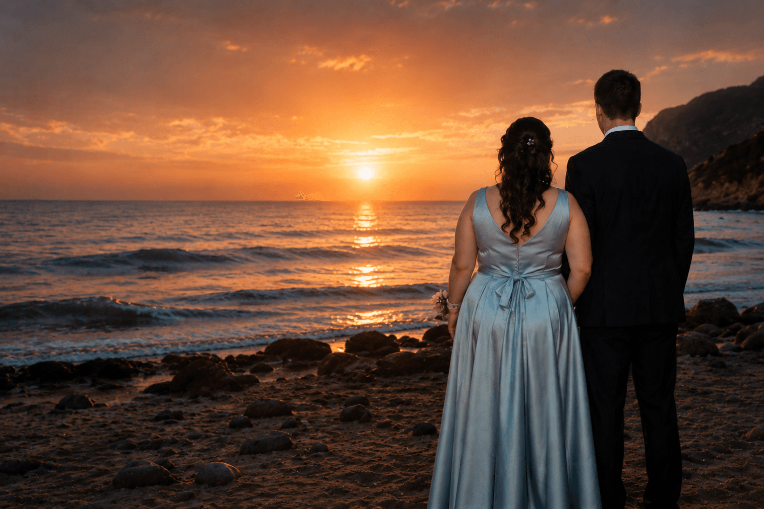 Us, watching the sunset over the ocean