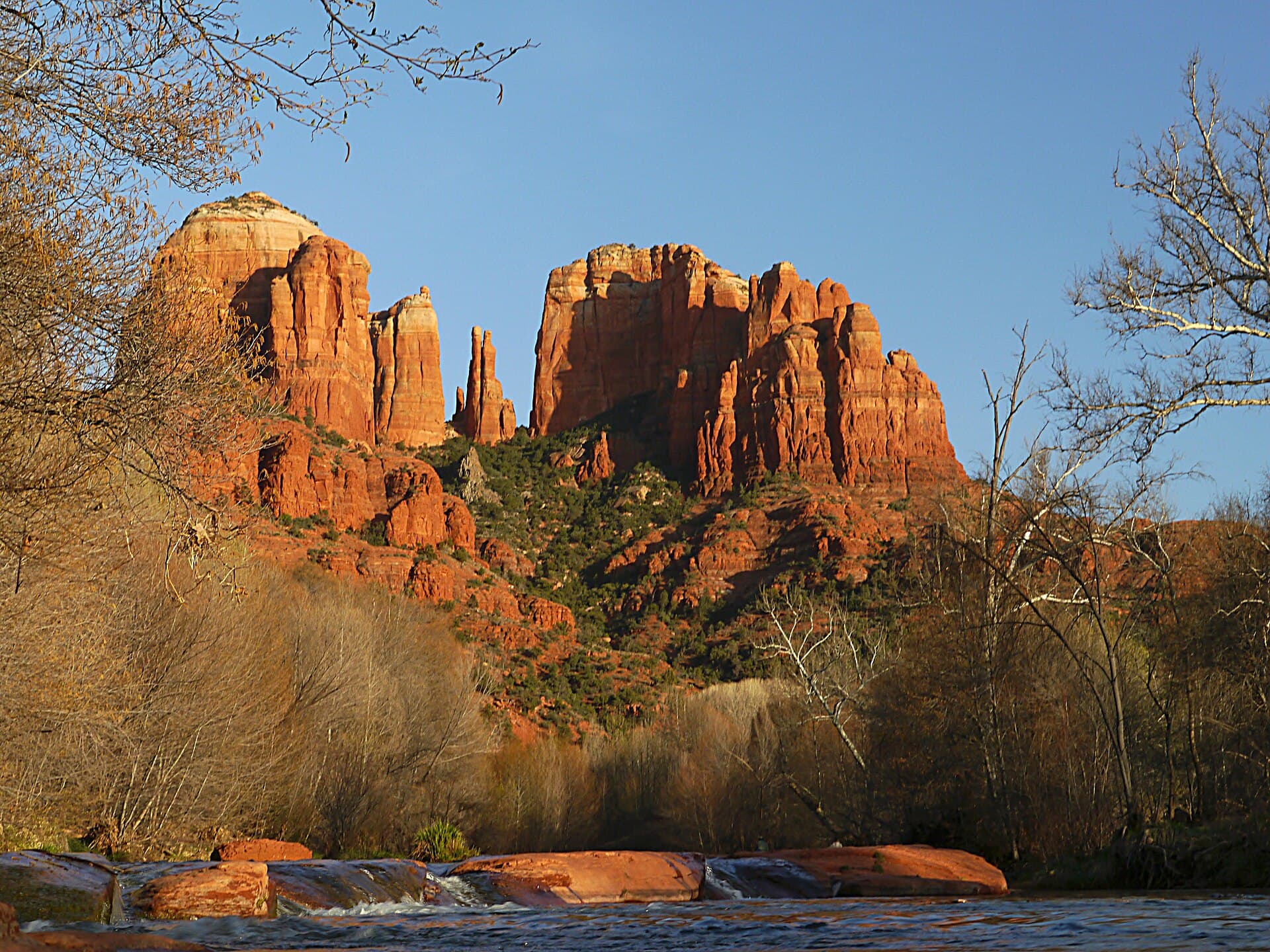 Cathedral Rock glowing red at sunset in Sedona, Arizona