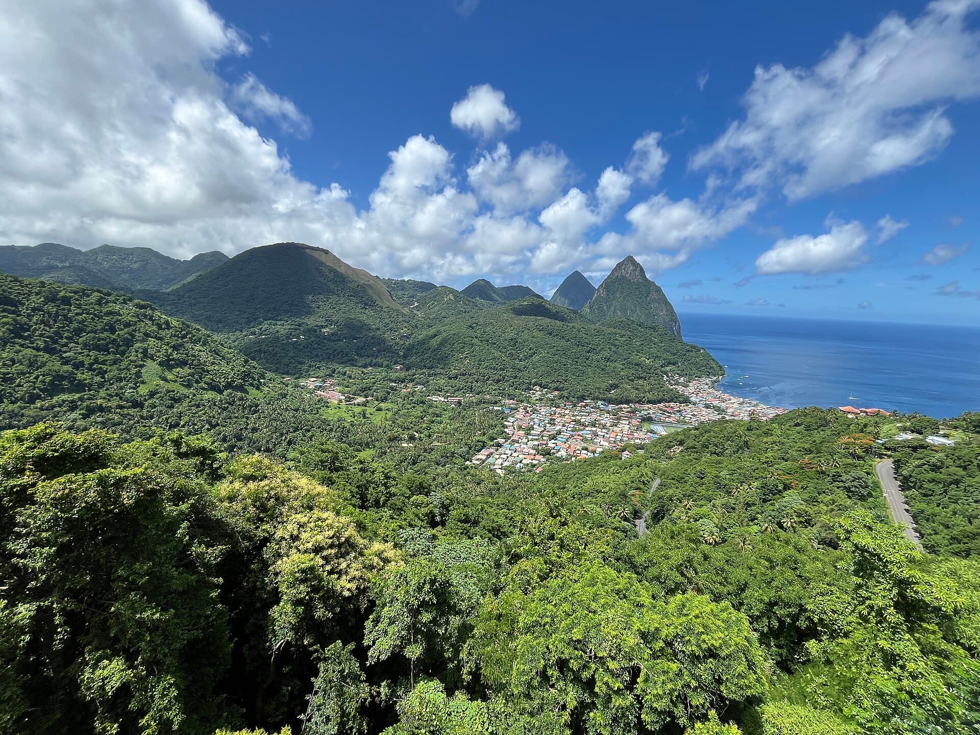 The town of Soufrière and the twin Piton peaks on the coast of St. Lucia